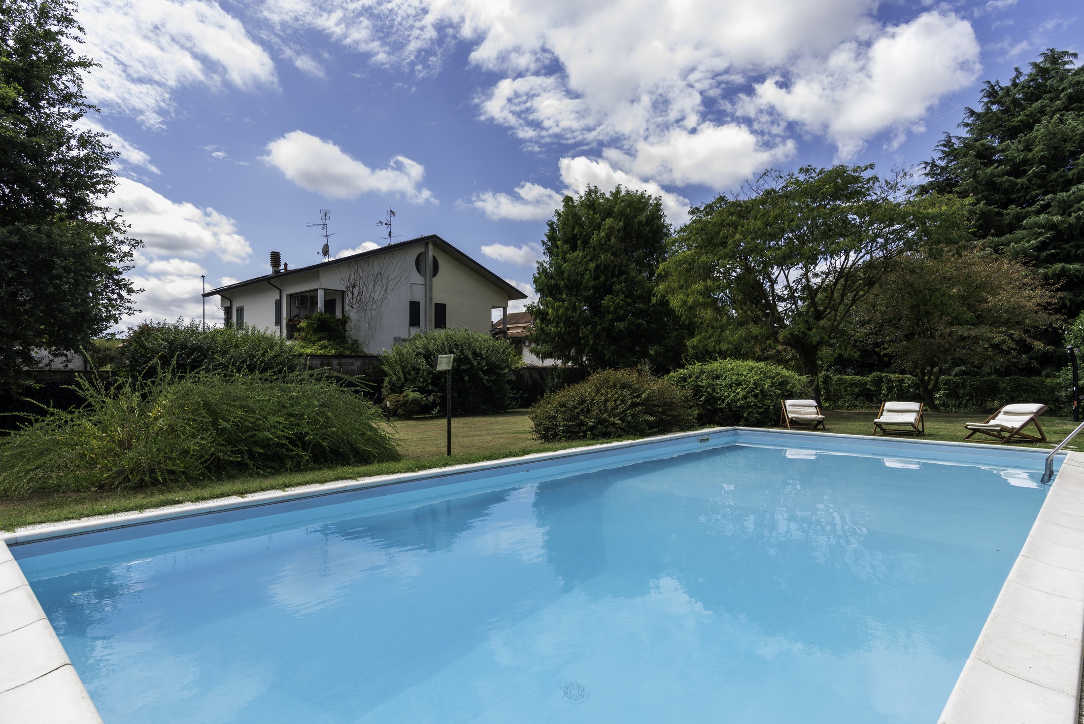 The pool — the sister property visible beyond