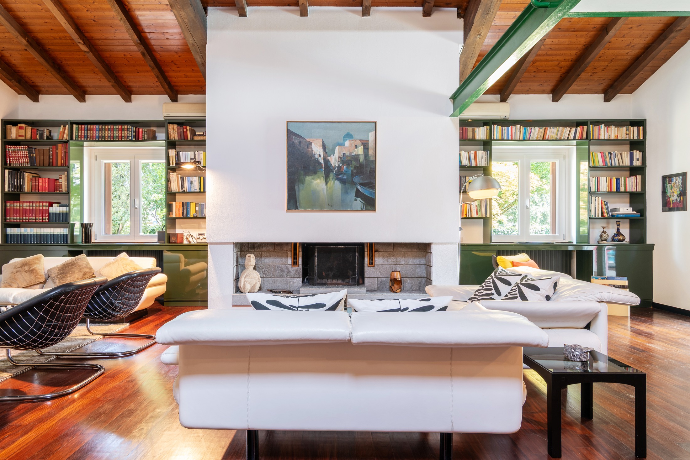 The fireplace and library